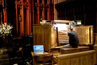 Christoph Bull, organist, selecting sounds from the 328 ranks on the Great Organs of FCCLA